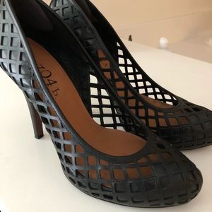 Leather perforated shoes.